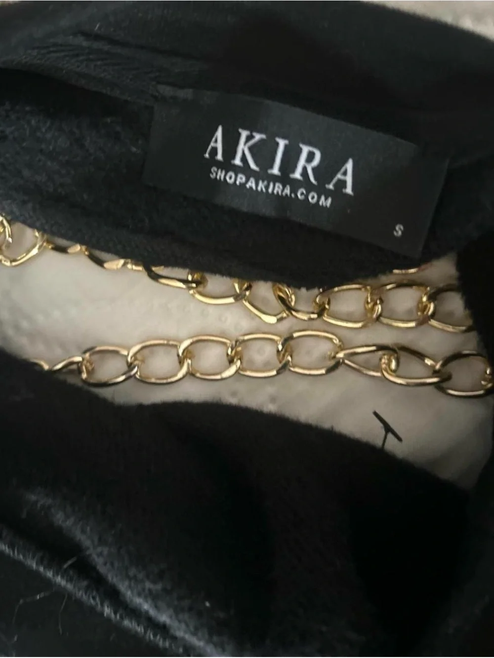 AKIRA Black Crewneck Sweater with Chain Accent